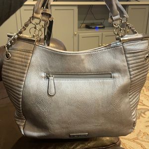 Large silver brand new shoulder bag.